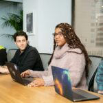 people in a group discussing app development